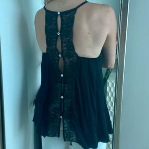 Lace trim black flowy camisole. Open back.